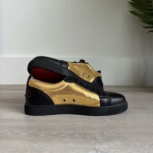 Christian Louboutin Black and Gold Sneakers with Modern Elegance